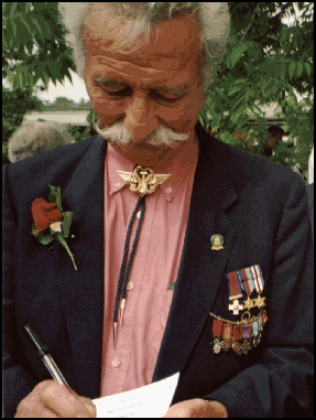  BOB MALOUBIER BUSY SIGNING HIS AUTOGRAPH 